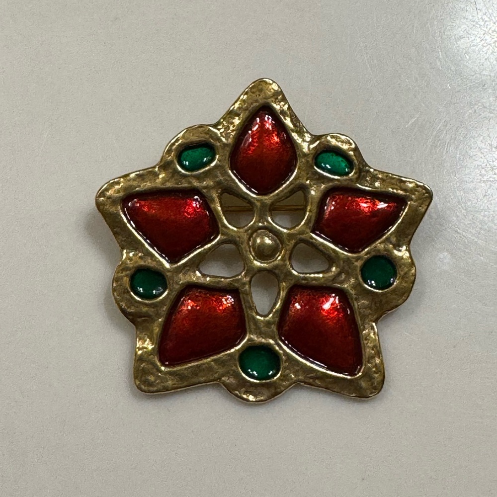Museum of Modern Art plique a jour poinsettia star brooch